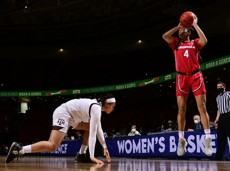 Georgia's Mikayla Coombs (4) snags a pass over a Texas A&M defender during their SEC women's tournament game Saturday, March 6, 2021, in Greenville, S.C. (Todd Van Emst/SEC)