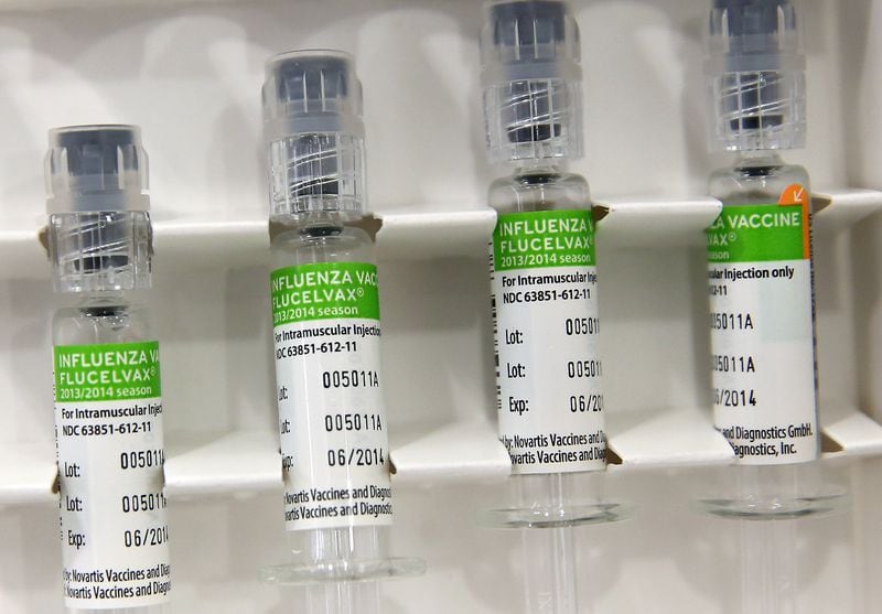 CONCORD, CA - JANUARY 14:  Syringes filled with influenza vaccination are seen at a Walgreens Pharmacy on January 14, 2014 in Concord, California.  Public health officials are encouraging residents to get flu shots as an aggressive strain of the H1N1 "swine flu" has killed 15 people in the San Francisco Bay Area.  (Photo Illustration by Justin Sullivan/Getty Images)