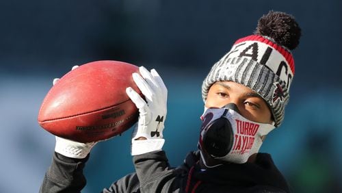 January 13, 2018 Philadelphia: Falcons wide receiver Taylor Gabriel is bundled up while preparing to play the Eagles in their NFC Divisional Game on Saturday, January 13, 2018, in Philadelphia.    Curtis Compton/ccompton@ajc.com