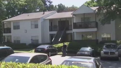 Cobb County police are investigating a home invasion at Greenhouse Apartments in Kennesaw. (Credit: Channel 2 Action News)