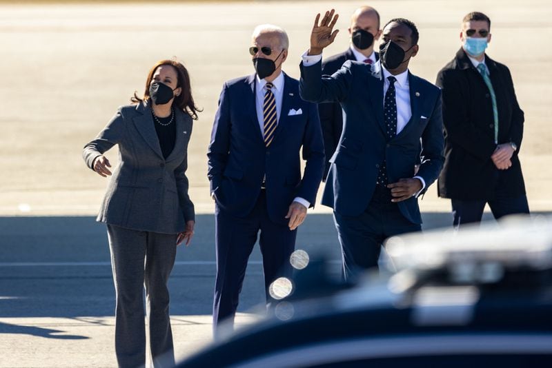 President Joe Biden and Vice President Kamala Harris talk with Atlanta Mayor Andre Dickens as he waves over his daughter Bailey Dickens in Atlanta, Georgia on January 11th, 2022 ahead of a speech on voting rights. (Nathan Posner for The Atlanta Journal-Constitution)

