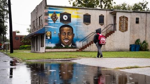 A mural of Ahmaud Arbery is painted on the Brunswick African American Cultural Center. (Nicole Craine/The New York Times)