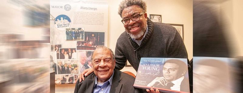 In celebration of Andrew Young's 90th birthday, the release of the book and opening of the 90-day-exhibit "The Many Lives of Andrew Young" takes place at the Millennium Gate in Atlantic Station on Friday, March 11, 2022.  Andrew Young tells stories and poses with Ernie Suggs, of the Atlanta Journal-Constitution wrote the book after hours of interviews and decades following the Ambassador's life and career.  Young will cut the ribbon on the exhibit at tonight's gala.   (Jenni Girtman for The Atlanta Journal-Constitution)