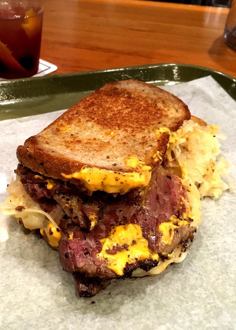 The pastrami Reuben from Fred’s is a sloppy but satisfying combination of fatty, smoked beef, sauerkraut, Swiss cheese and Russian dressing. Fred’s is part of the Canteen in Midtown. CONTRIBUTED BY WYATT WILLIAMS