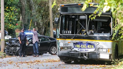 A car was traveling west on Campbellton Road when it veered into the east lane and hit a MARTA bus. JOHN SPINK / JSPINK@AJC.COM