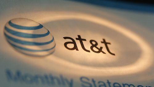 An AT&T spokesman confirmed plans to move jobs from Atlanta to LA and Dallas but declined to give details. (Photo Illustration by Tim Boyle/Getty Images)