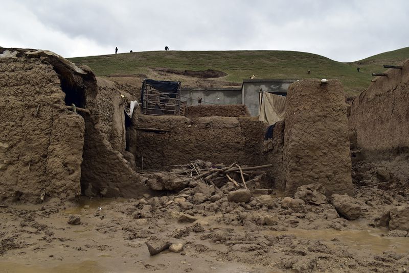 A damaged house is seen after heavy flooding in Baghlan province in northern Afghanistan. Saturday, May 11, 2024. Flash floods from seasonal rains in Baghlan province in northern Afghanistan killed dozens of people on Friday, a Taliban official said. (AP Photo/Mehrab Ibrahimi)