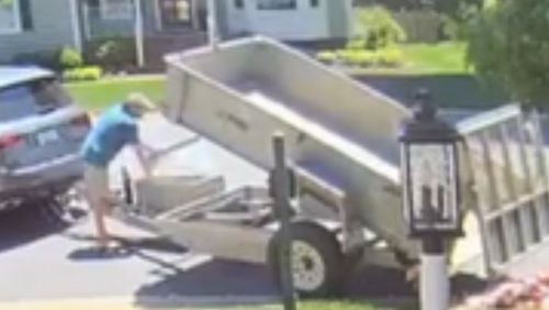 Home security footage shows the moment when a Virginia father made his final child support payment to his ex-wife last month by dumping a trailer filled with 80,000 pennies onto her front lawn, according to reports.