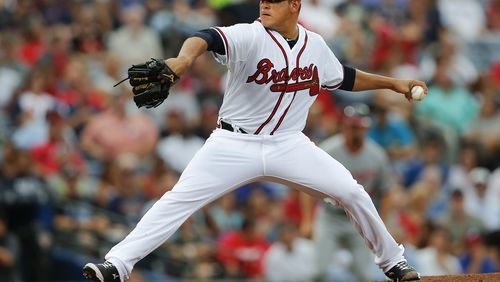 Braves starter Manny Banuelos threw a two-hit shut out in his major league debut before having to leave with cramping and dehydration. (AP Photo/John Bazemore)