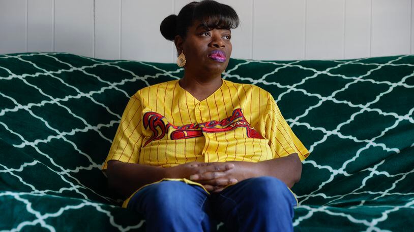 Nora Williams poses for a portrait at her daughter’s apartment where she currently lives. This year, Williams qualified for a basic cash income program that financially assists women in need in College Park.  (Natrice Miller/natrice.miller@ajc.com)