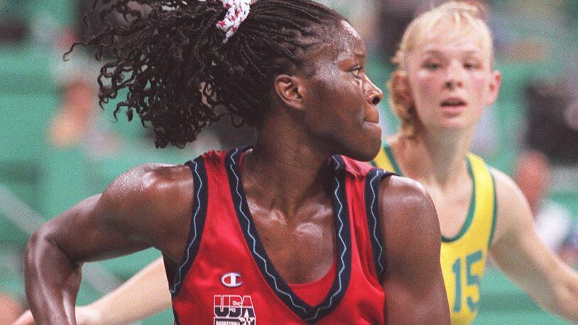 Katrina McClain of the U.S. women's basketball team grabs a rebound in game against Australia Friday, Aug. 2, 1996 during the 1996 Summer Olympic Games in Atlanta.