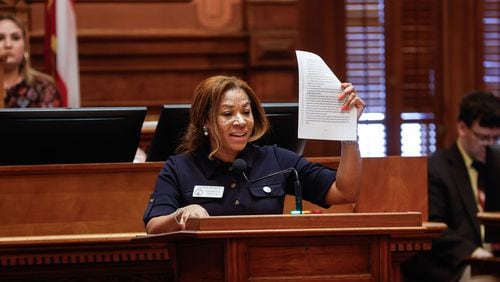 Rep. Mesha Mainor, R-Atlanta, speaks in favor of Senate Bill 233 at the Georgia State Capitol on March 14. The bill, which the governor signed, gives $6,500 a year in state funds to the parents of each child who opts for private schooling. (Natrice Miller/ Natrice.miller@ajc.com)