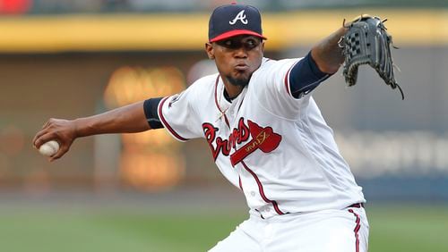 Atlanta Braves starting pitcher Julio Teheran works in the first inning of a baseball game against the Los Angeles Dodgers on Wednesday, April 20, 2016, in Atlanta . (AP Photo/John Bazemore)