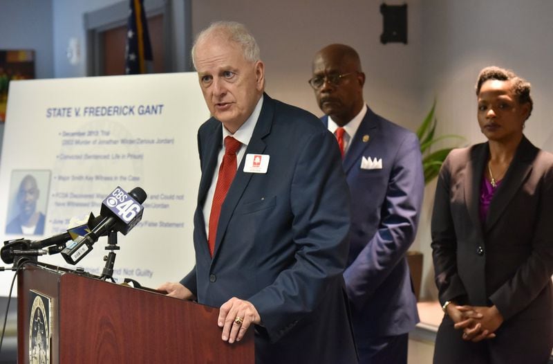Former Georgia Gov. Roy Barnes speaks as Fulton County District Attorney Paul Howard (center) and Melissa Redmon (right), a University of Georgia School of Law professor, listen during a news conference to announce the creation of a Conviction Integrity Unit at the Fulton County district attorney’s office on Tuesday, May 7, 2019. Barnes and Redmon will serve as consultants to the Conviction Integrity Unit. 