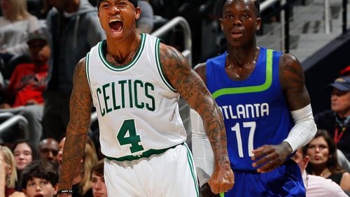 Isaiah Thomas of the Boston Celtics reacts after hitting a 3-point basket against the Dennis Schroder of the Atlanta Hawks at Philips Arena on January 13, 2017 in Atlanta, Georgia. (Photo by Kevin C. Cox/Getty Images)