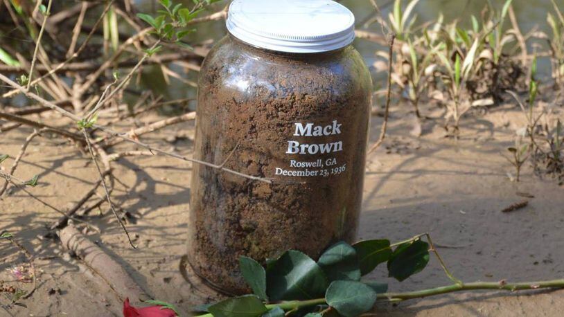 Members from the Fulton County Remembrance Coalition collected soil from the a riverbank near the area where the body of Mack Henry Brown was found in 1936. Photo Courtesy Rev. Patricia Templeton