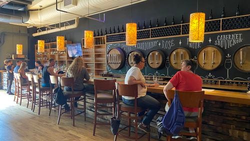 A handful of City Winery patrons in Atlanta enjoy a drink at the bar earlier this year.
Ligaya Figueras / ligaya.figueras@ajc.com
