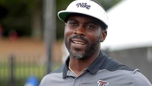 Former Atlanta Falcons quarterback Michael Vick speaks to members of the media during training camp at the Falcons Practice Facility, Wednesday, Aug. 10, 2022, in Flowery Branch, Ga. (Jason Getz / Jason.Getz@ajc.com)