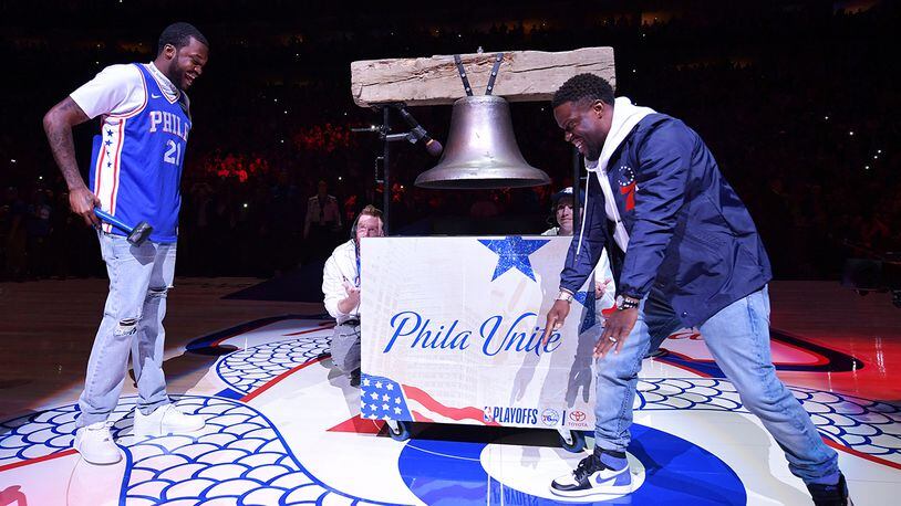PHILADELPHIA, PA - APRIL 24: (L-R) Rapper Meek Mill laughs as Kevin Hart bows to him before ringing a replica Liberty Bell at Wells Fargo Center on April 24, 2018 in Philadelphia, Pennsylvania. (Photo by Drew Hallowell/Getty Images)