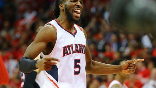 042915 ATLANTA: Hawks forward DeMarre Carroll reacts to scoring against the Nets during the second half in a 107-97 victory over the Nets in their first round, game five basketball game on Wednesday, April 29, 2015, in Atlanta. Curtis Compton / ccompton@ajc.com
