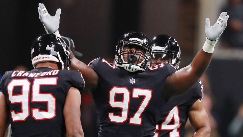 Atlanta Falcons defensive tackle Grady Jarrett reacts after sacking New York Giants Eli Manning during the first quarter Oct 22, 2018, at Mercedes-Benz Stadium in Atlanta.