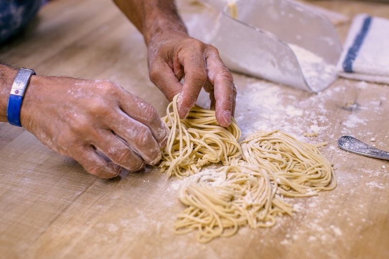 Chef Jamie Adams makes fresh pasta at il Giallo Osteria & Bar in Sandy Springs. CONTRIBUTED BY DEBBIE ROSEN, THE ROSEN GROUP ATLANTA