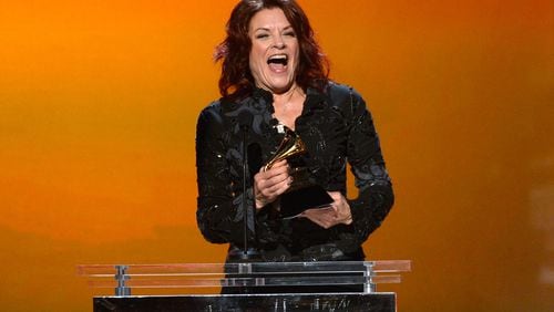 onstage during the The 57th Annual GRAMMY Awards Premiere Ceremony at Nokia Theatre L.A. Live on February 8, 2015 in Los Angeles, California. Rosanne Cash reacts to a Grammy win. Photo: Getty Images.