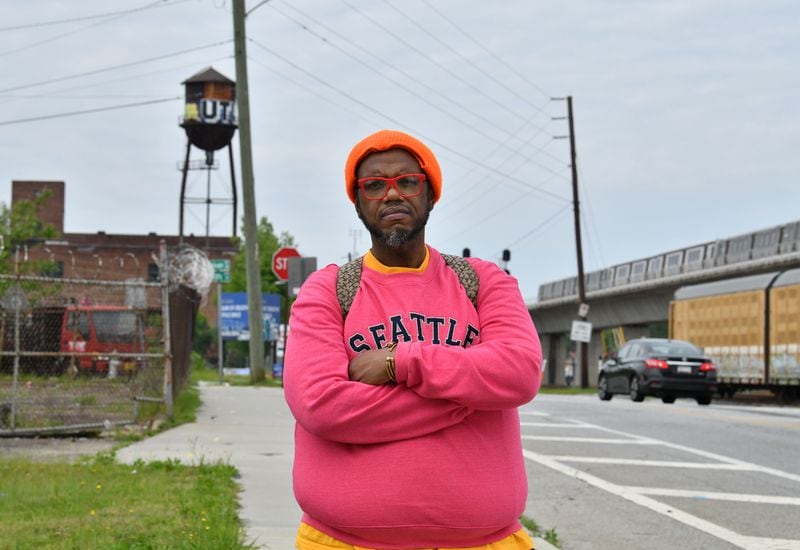 Quadrus Black, chair of the Neighborhood Planning Unit that includes Murphy Crossing, poses for a portrait near the intersection of Murphy Avenue Southwest and Sylvan Road Southwest on Wednesday, April 24, 2024. (Hyosub Shin / AJC)