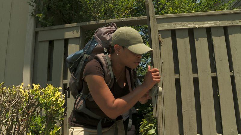  Angela Brinson of Douglasville trying to escape hunters in "Hunted" on CBS.