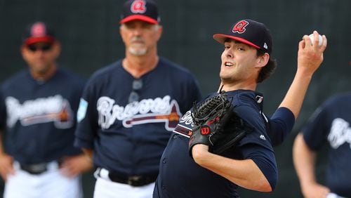 Braves pitching coach Rick Kranitz watches pitcher Ian Anderson work in the bullpen during spring training Wednesday, Feb. 20, 2019, at the ESPN Wide World of Sports Complex in Lake Buena Vista, Fla.