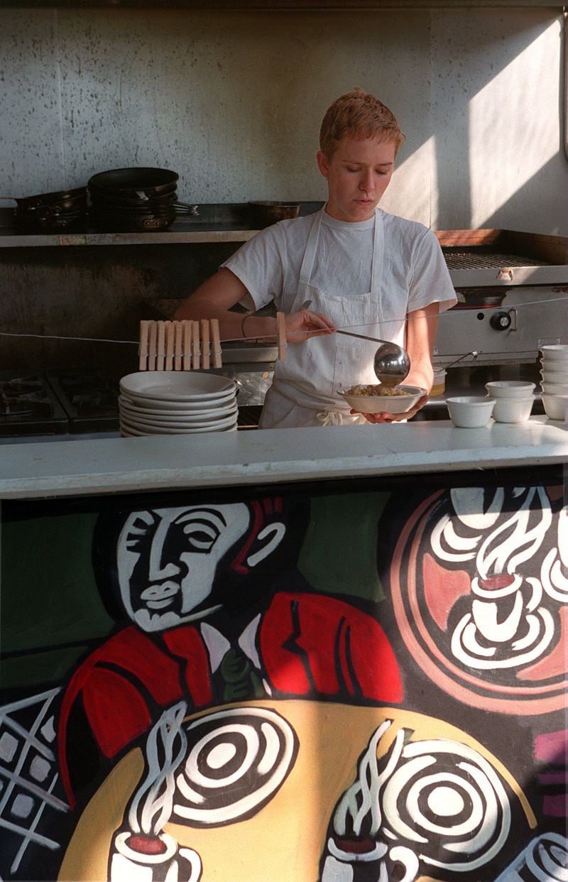 Penney Balmes dishes out a bowl of chicken soup at Roman Lily Cafe on Highland Ave. in Atlanta in 1998. (PHIL SKINNER/AJC STAFF)