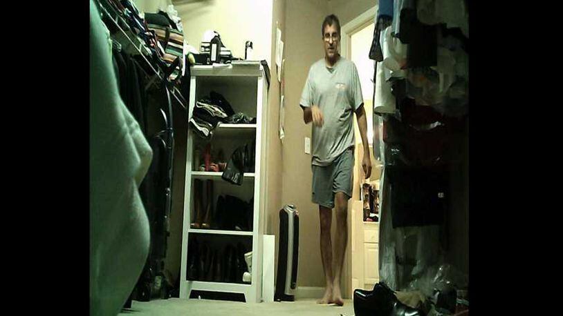 A still from the video camera Michael Derek Roberts installed in his neighbor’s home shows him in the family's master closet.