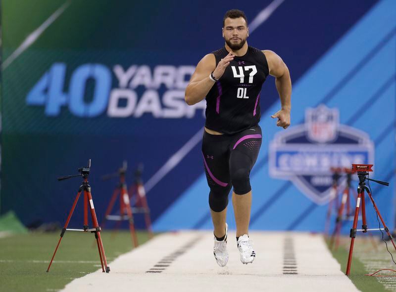 Texas offensive lineman Connor Williams runs the 40-yard dash during the NFL football scouting combine, Friday, March 2, 2018, in Indianapolis. (AP Photo/Darron Cummings)