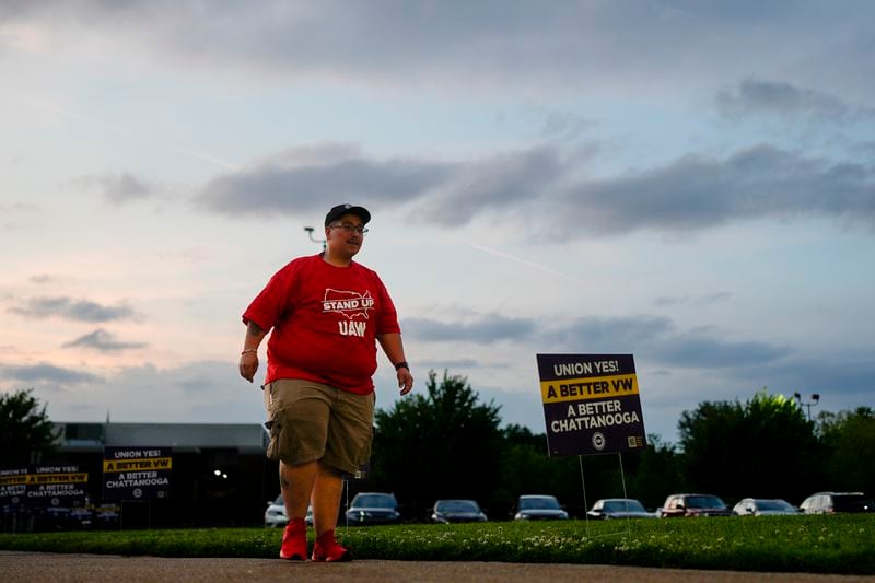 Volkswagen automobile plant employee Duke Brandon arrives for a watch party to see the results of their union election, Friday, April 19, 2024, in Chattanooga, Tenn. Workers finished voting Friday night on whether to join the United Auto Workers union. (AP Photo/George Walker IV)