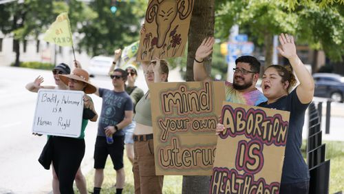 Protesters cheer as cars pass by and honk outside the state Capitol on Sunday, July 3, 2022, in Atlanta. For the second weekend, abortion rights supporters continue to protest the U.S. Supreme Court's reversal of Roe v Wade. (Photo: Miguel Martinez / Miguel.martinezjimenez@ajc.com)