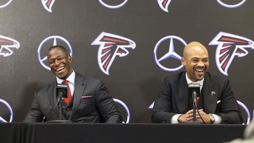 Atlanta Falcons coach Raheem Morris and general manager Terry Fontenot share a laugh while responding to a question Monday, Monday, Feb. 5, 2024, during Morris' introductory press conference. (Jason Getz/The Atlanta Journal-Constitution/TNS)