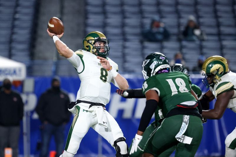 Grayson quarterback Jake Garcia (8) attempts a pass in the first half against Collins Hill during the Class 7A state high school football final Wednesday, Dec. 30, 2020, at Center Parc Stadium in Atlanta. (Jason Getz/For the AJC)


