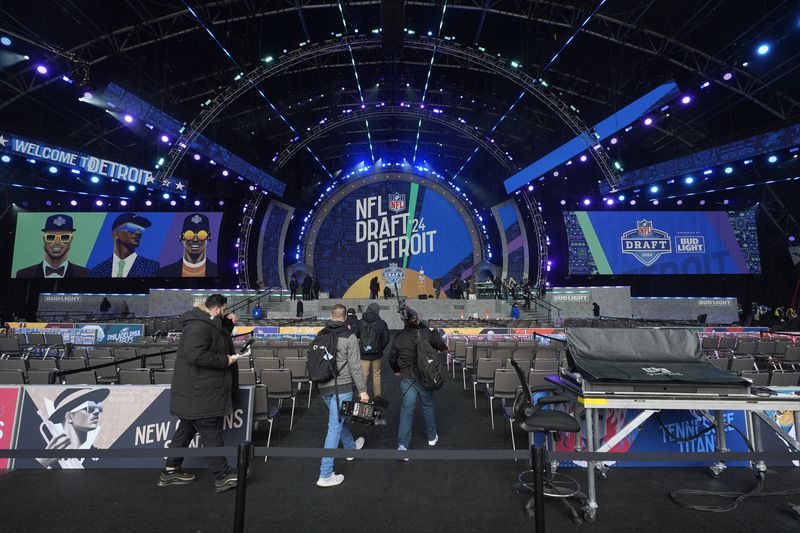 Workers prepare for the NFL Draft Wednesday, April 24, 2024, in Detroit. (AP Photo/Paul Sancya)
