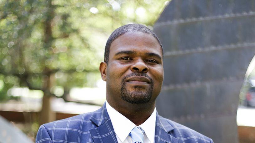 Darren Hutchinson is the first person to take the John Lewis Chair for Civil Rights and Social Justice at Emory University School of Law.