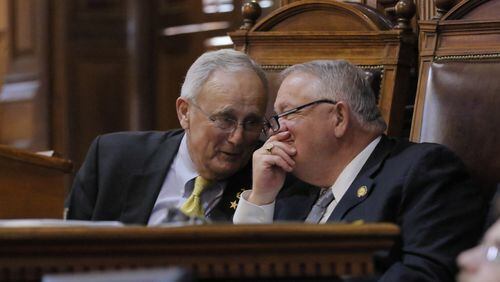 House Rules Committee Chairman John Meadows confers with House Speaker David Ralston during session earlier this week. BOB ANDRES /BANDRES@AJC.COM