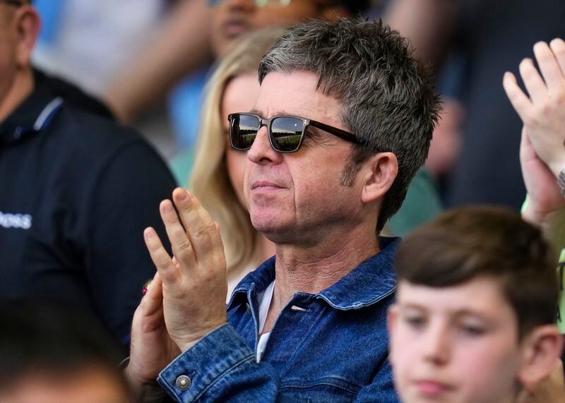 Manchester musician Noel Gallagher applauds during the English Premier League soccer match between Fulham and Manchester City at the Craven Cottage Stadium in London, Saturday, May 11, 2024. (AP Photo/Kirsty Wigglesworth)
