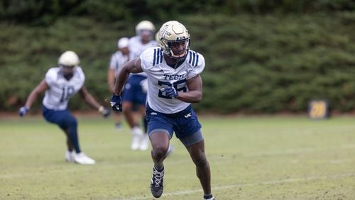 Charlie Thomas runs during the first day of spring practice for Georgia Tech football in February at Alexander Rose Bowl Field. (Photo Jenn Finch)