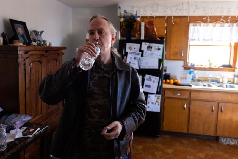 Brian Crossmon, who evacuated to a motel, temporarily returns to his home in East Palestine, Ohio on Saturday, February 18, 2023 to run errands and speak with a reporter.  (Arvin Temkar / arvin.temkar@ajc.com)