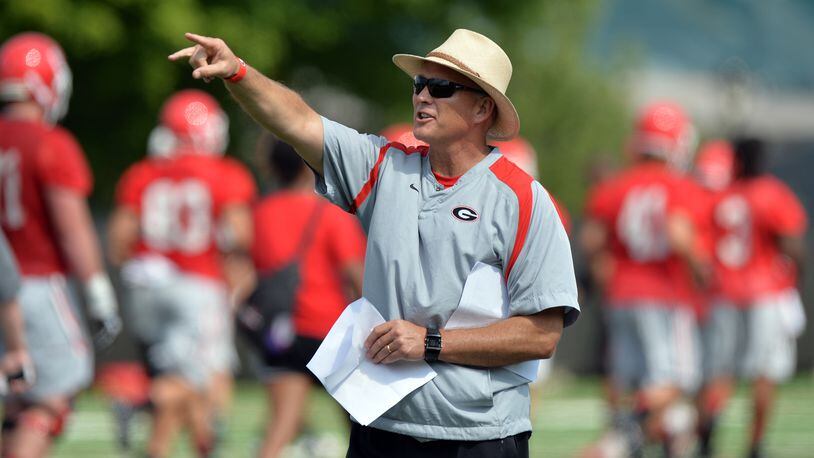 Georgia head coach Mark Richt gives instructions during the first day of practice Friday August 1, 2014. BRANT SANDERLIN /BSANDERLIN@AJC.COM .