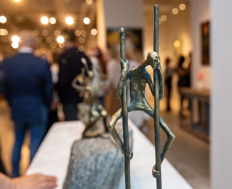 “Fear Has Big Eyes,” is a bronze piece on display at the Buckhead Art & Company opening of a month-long show featuring artists from Ukraine. (Jenni Girtman for The Atlanta Journal-Constitution)