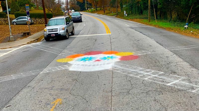 A couple of years ago, some graffiti artist decided to let the world know his or her thoughts about the dangerous intersection at North Decatur Road and Superior Avenue. Photo by Cindy Giver