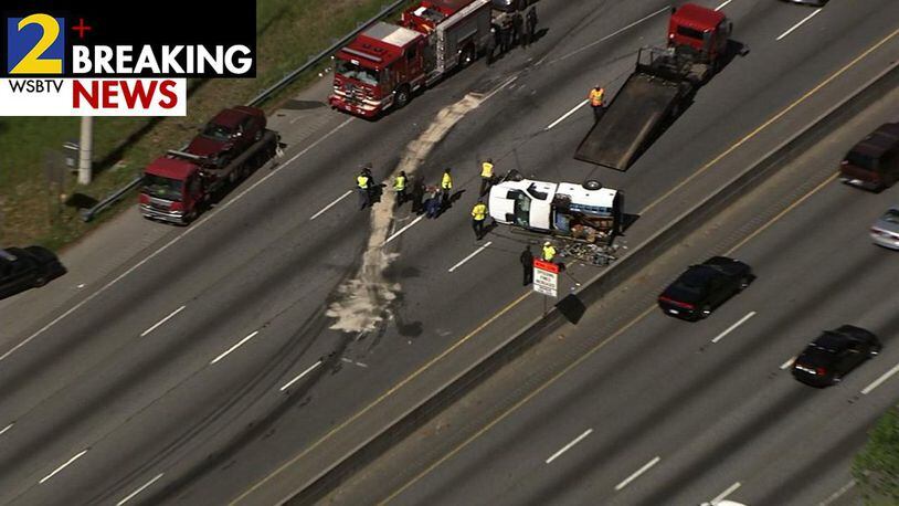 Westbound I-285 in DeKalb County has reopened after a 10-vehicle crash that left four adults and two children injured. (Credit: Channel 2 Action News)