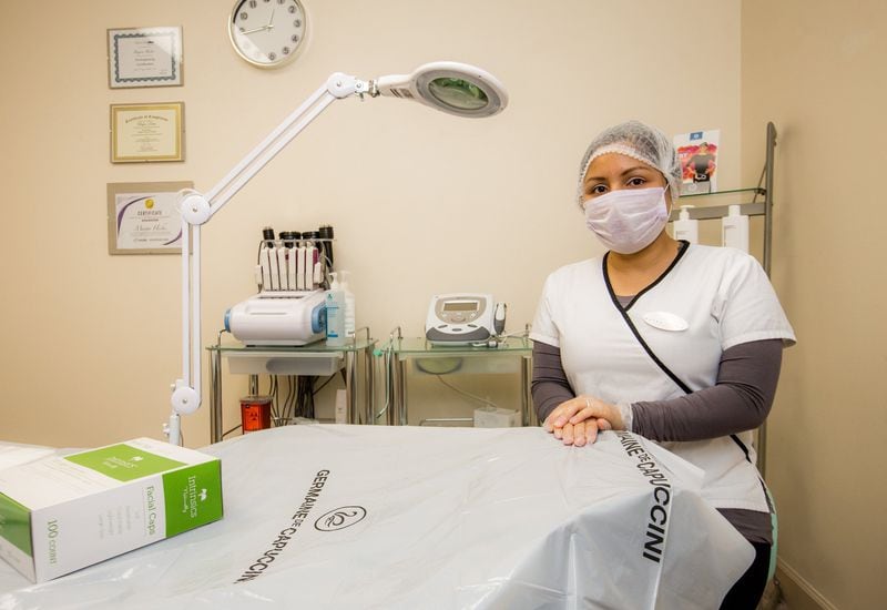 Skin and Silhouette Spa in Marietta reopens on Friday. Mayra Hicks is taking appointments, modifying procedures, bringing in disposable supplies and texting directions to clients Thursday, April 23, 2020. She has disposable sheets and hair caps rather than using her linens and cloth headbands. (Jenni Girtman for Atlanta Journal-Constition)