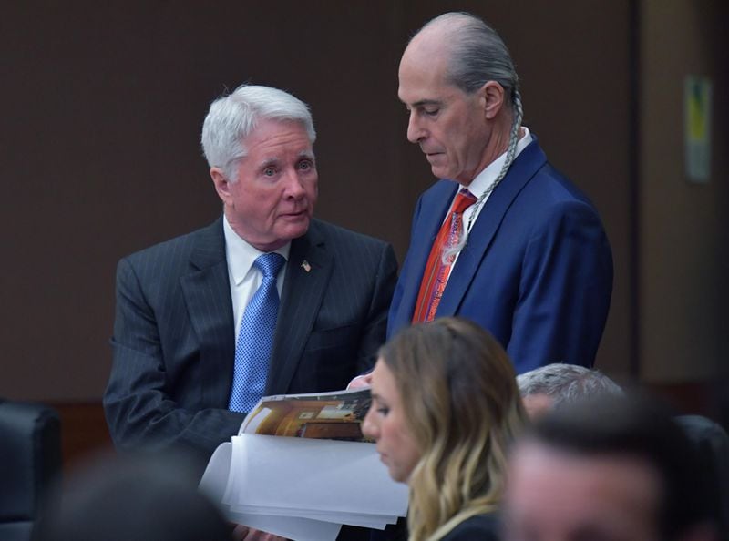 March 20, 2018 Atlanta - Tex McIver confers with defense attorney Bruce Harvey during the 6th day of trial for Tex McIver before Fulton County Chief Judge Robert McBurney on Tuesday, March 20, 2018. HYOSUB SHIN / HSHIN@AJC.COM