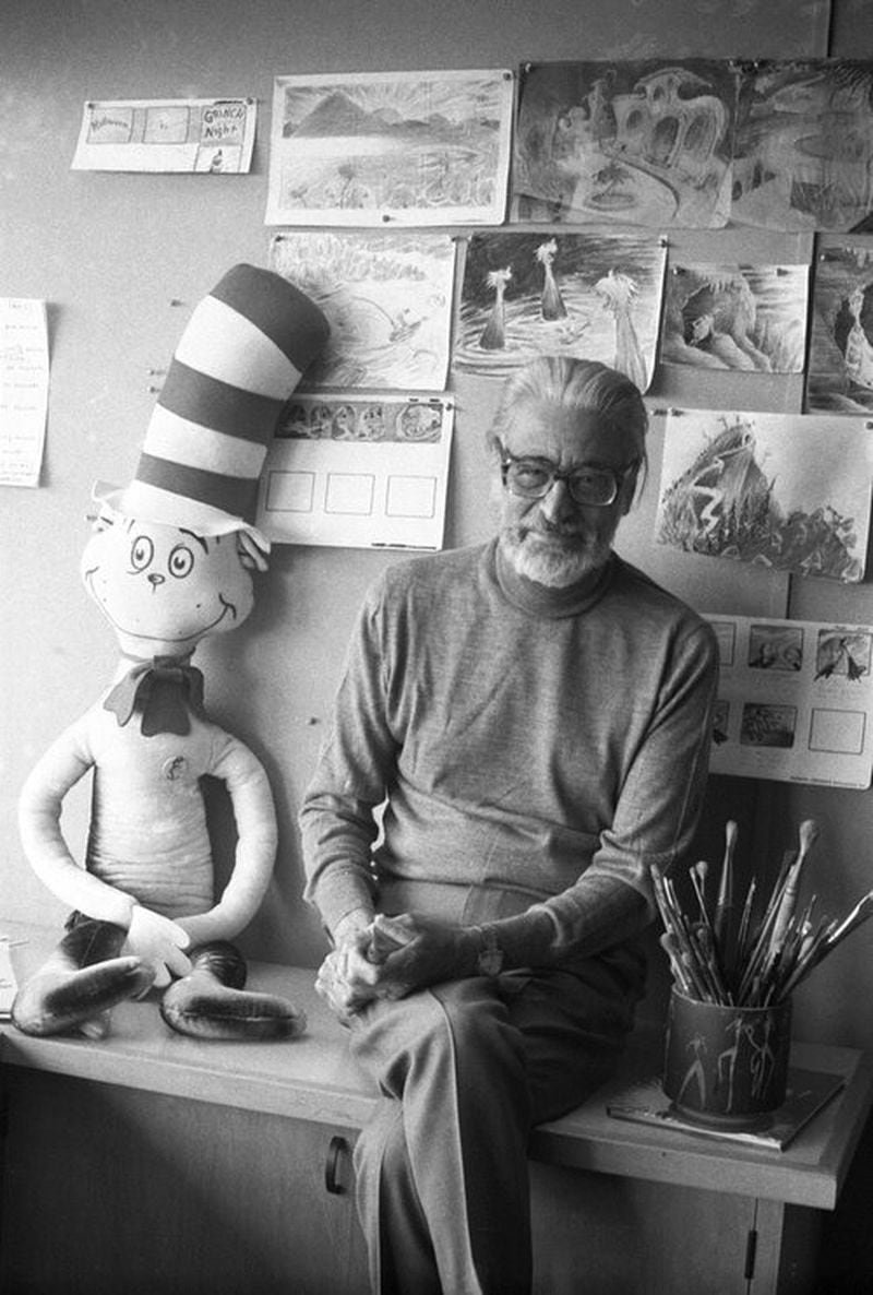 Theodor Seuss Geisel in his studio with one of his creations, the Cat in the Hat. CONTRIBUTED: ANN JACKSON GALLERY